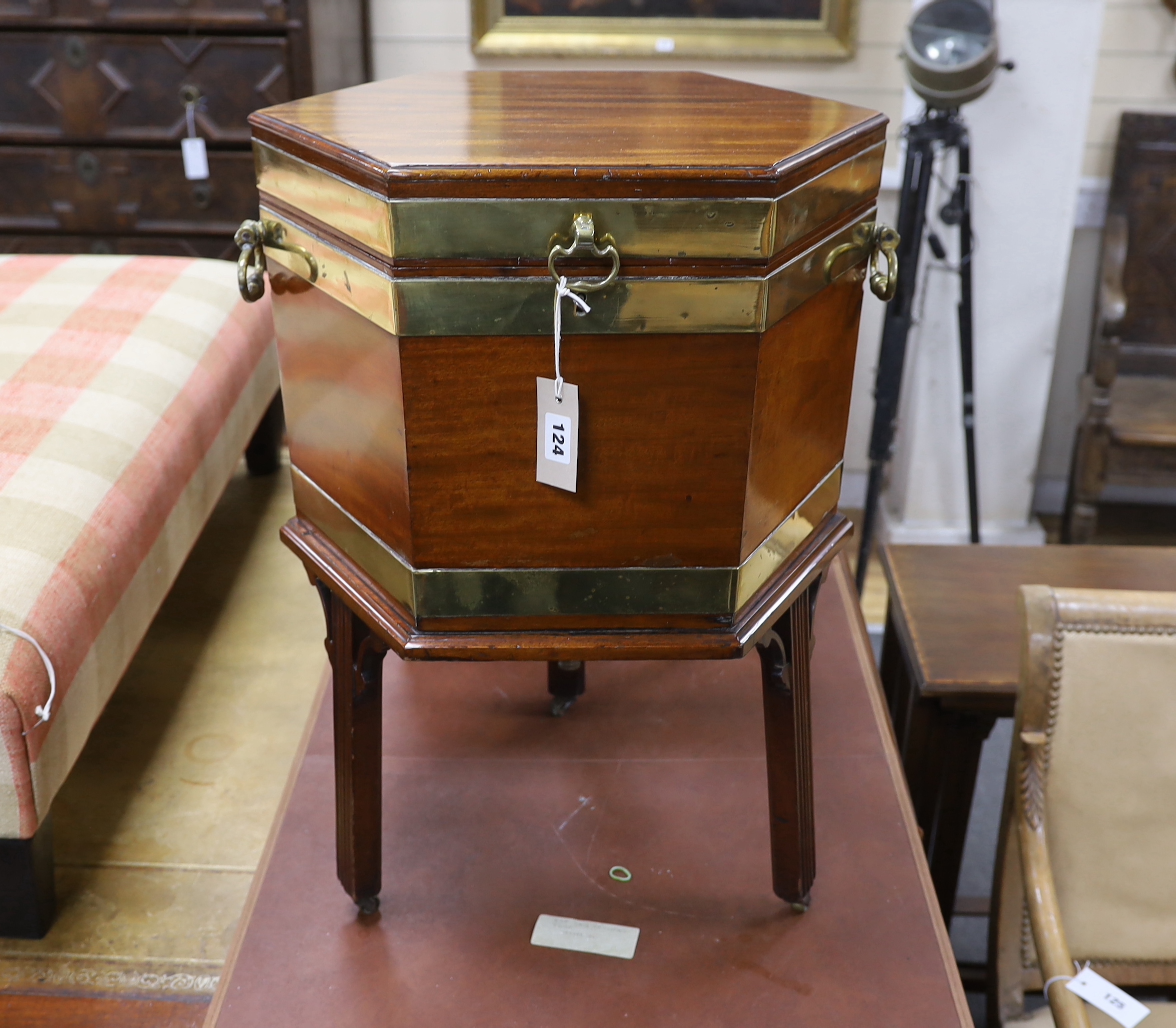 A George III hexagonal brass-bound wine cooler, width 48cm, height 66cm